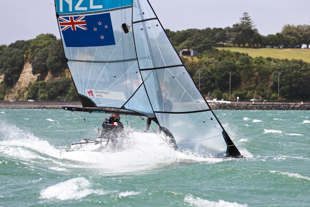 Tim Dempsey helming a SKUD18 plants into a big one - Day 4, Oceanbridge Sail Auckland 2013 © Richard Gladwell www.photosport.co.nz